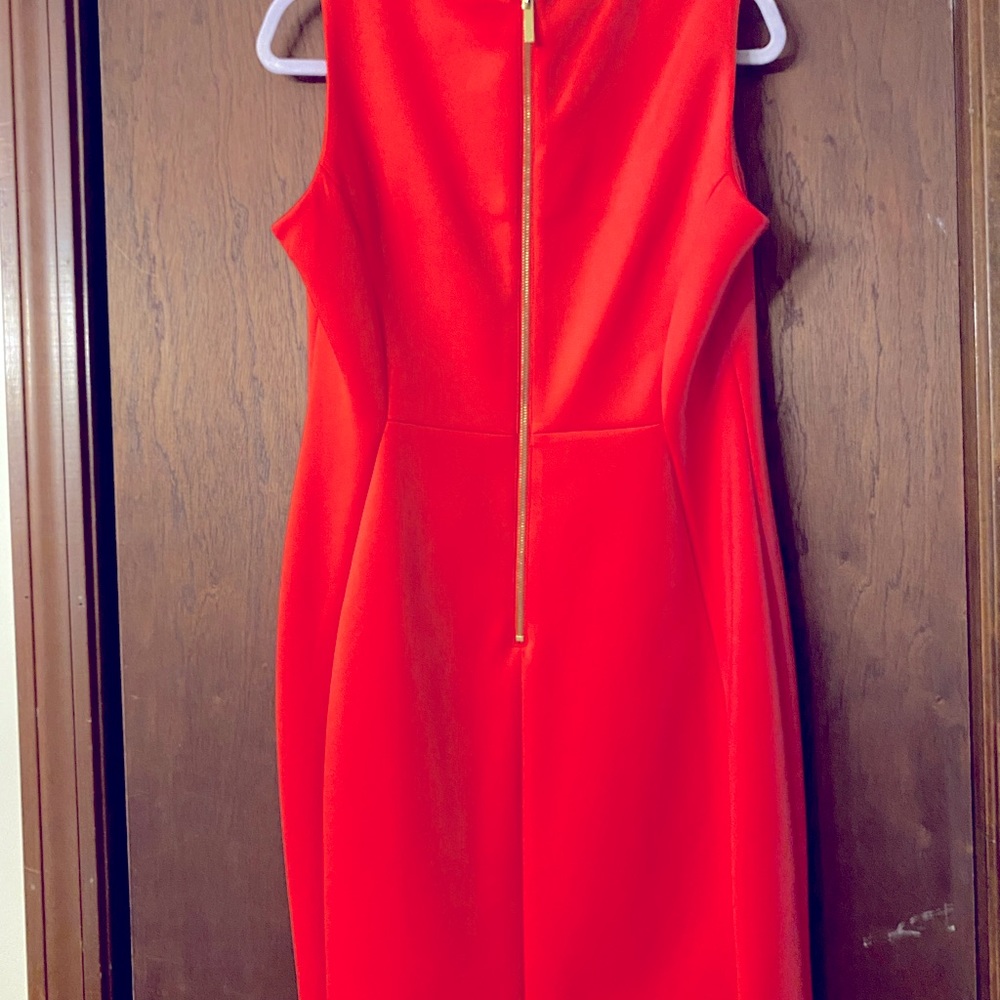 Calvin Klein dress very nice on has a good stretch beautiful watermelon color